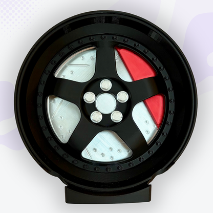 Throttle the Black Mag Wheel with Caliper Headphone and Controller Stand